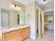 Bathroom features double sinks and access to the bedroom and toilet at 1012 Gloria Grand Blvd, Mcdonough, GA 30252
