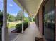 Long front porch with brick facade and pillars at 1012 Gloria Grand Blvd, Mcdonough, GA 30252