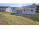 Well-maintained backyard with an open patio connected to a house at 3350 Cooper Woods Dr, Loganville, GA 30052