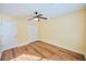 An empty bedroom features vinyl floors, a ceiling fan, and closet at 3350 Cooper Woods Dr, Loganville, GA 30052