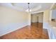 Formal dining room featuring hardwood floors, decorative wainscoting, and a stylish chandelier at 3350 Cooper Woods Dr, Loganville, GA 30052