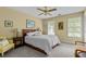 Cozy bedroom features a queen-sized bed, carpeted floors, and plenty of natural light at 3510 Smoke Rise Way, Lawrenceville, GA 30044