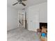 Bedroom with carpet, white walls, and boxes with view of staircase through an open doorway at 3510 Smoke Rise Way, Lawrenceville, GA 30044