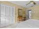 Bedroom with carpeted floors and closet features natural lighting coming from two windows at 3510 Smoke Rise Way, Lawrenceville, GA 30044