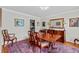 Charming dining room with hardwood table, rug, and stylish decor at 3510 Smoke Rise Way, Lawrenceville, GA 30044