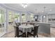 Dining room with direct access to the kitchen and outdoor deck at 3510 Smoke Rise Way, Lawrenceville, GA 30044