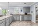 Updated eat-in kitchen with stainless steel appliances and granite countertops at 3510 Smoke Rise Way, Lawrenceville, GA 30044
