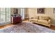 Cozy living room with hardwood floors, shutters, and a comfortable seating area at 3510 Smoke Rise Way, Lawrenceville, GA 30044