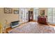 Spacious living room with hardwood floors, shutters, and ample natural light at 3510 Smoke Rise Way, Lawrenceville, GA 30044