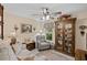 Cozy living area featuring neutral paint, wood floors, and natural light at 3927 Collier Nw Trce, Kennesaw, GA 30144