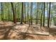 Community playground with swings and slides next to the lake, creating a recreational space for children and families at 3927 Collier Nw Trce, Kennesaw, GA 30144