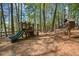 Community playground area with a slide and climbing structure, offering a fun and safe space for children to play at 3927 Collier Nw Trce, Kennesaw, GA 30144