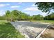 A well-maintained sand volleyball court with a net and boundary markers at 3927 Collier Nw Trce, Kennesaw, GA 30144