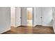 This bedroom features hardwood floors, an adjacent bathroom and an adjacent closet at 4368 Heritage Glen Ct, Marietta, GA 30068