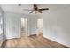 Bright bedroom with hardwood floors, ceiling fan, and closet space at 4368 Heritage Glen Ct, Marietta, GA 30068