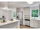 Modern kitchen with stainless steel appliances, island, and open layout at 4368 Heritage Glen Ct, Marietta, GA 30068