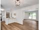 Open-concept living room with hardwood floors connected to a modern kitchen at 4368 Heritage Glen Ct, Marietta, GA 30068