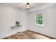 Cozy room with wood floors, a window, and a decorative table at 4368 Heritage Glen Ct, Marietta, GA 30068