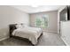 Neutral bedroom with soft carpet, a double bed, and natural light at 5041 Corinault Nw Pl, Acworth, GA 30101