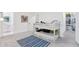 Charming bedroom featuring bunk beds, built-in shelving, and an adjacent bathroom, perfect for a Gathering at 5041 Corinault Nw Pl, Acworth, GA 30101