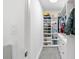 Organized closet with custom shelving for shoes, toys, and clothes, maximizing storage space and tidiness at 5041 Corinault Nw Pl, Acworth, GA 30101
