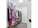 Well-organized walk-in closet featuring ample storage for clothes and shoes, maximizing space at 5041 Corinault Nw Pl, Acworth, GA 30101