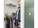 Neat walk-in closet with wire shelving and rods for maximum storage and organization at 5041 Corinault Nw Pl, Acworth, GA 30101
