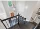 Open foyer with grand chandelier and staircase leading to the upper level at 5041 Corinault Nw Pl, Acworth, GA 30101