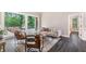Well-lit living room with access to the deck, comfortable seating, and stylish accents at 5041 Corinault Nw Pl, Acworth, GA 30101