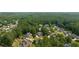 Neighborhood aerial view of the property's location in a lush, wooded community at 5041 Corinault Nw Pl, Acworth, GA 30101