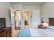 Tranquil bedroom with a connecting bathroom, offering privacy and convenience at 6390 Yellow Birch St, Cumming, GA 30040