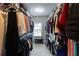Spacious walk-in closet with ample storage, shelving, and hanging space for clothes and accessories at 6390 Yellow Birch St, Cumming, GA 30040