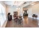 The dining area is a versatile space that connects to an open kitchen and billiard room at 6390 Yellow Birch St, Cumming, GA 30040