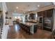 This gourmet kitchen has stainless steel appliances, granite countertops and lots of storage at 6390 Yellow Birch St, Cumming, GA 30040