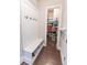Convenient mudroom area with built-in bench and storage, perfect for organizing coats and shoes at 6390 Yellow Birch St, Cumming, GA 30040