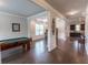 The home has a spacious open layout, perfect for entertaining, with a billiard table and game space at 6390 Yellow Birch St, Cumming, GA 30040