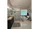 Bright bathroom with glass shower, soaking tub, granite countertop, and white marble flooring at 1270 Heritage Lakes Dr, Mableton, GA 30126