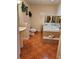 Bright bathroom features a soaking tub, tiled floor, pedestal sink, and neutral decor for a luxurious feel at 1270 Heritage Lakes Dr, Mableton, GA 30126