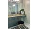 Chic bathroom with a dark vanity, granite countertop, and stylish vanity stool at 1270 Heritage Lakes Dr, Mableton, GA 30126