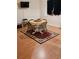 Game room with wood floors, area rug, chess table, and window creates an entertaining space at 1270 Heritage Lakes Dr, Mableton, GA 30126