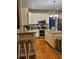 Well-equipped kitchen with stainless steel appliances, granite countertops, and hardwood floors at 1270 Heritage Lakes Dr, Mableton, GA 30126