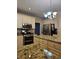 Updated kitchen with stainless steel appliances, granite countertops, and white cabinets at 1270 Heritage Lakes Dr, Mableton, GA 30126
