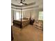 Bedroom with a four-poster bed, a ceiling fan, and carpet at 1270 Heritage Lakes Dr, Mableton, GA 30126