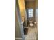 Compact powder room with a pedestal sink, toilet, and a small window for natural light at 1270 Heritage Lakes Dr, Mableton, GA 30126