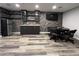 Finished basement with a wet bar, mini fridge, and modern finishes, great for entertaining at 2785 Old Sewell Rd, Marietta, GA 30068