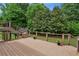 Large wooden deck offers views of the property's backyard and lawn at 2785 Old Sewell Rd, Marietta, GA 30068