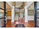 Grand foyer with high ceilings, hardwood floors, and an elegant staircase at 2785 Old Sewell Rd, Marietta, GA 30068