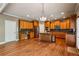 Spacious kitchen with stainless steel appliances, wooden cabinets, and an island with granite countertops at 2785 Old Sewell Rd, Marietta, GA 30068