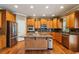 Well-equipped kitchen with stainless steel appliances, granite countertops, and a central island for meal preparation at 2785 Old Sewell Rd, Marietta, GA 30068