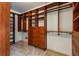 A spacious walk-in closet boasts custom shelving and drawers for ample storage at 2785 Old Sewell Rd, Marietta, GA 30068